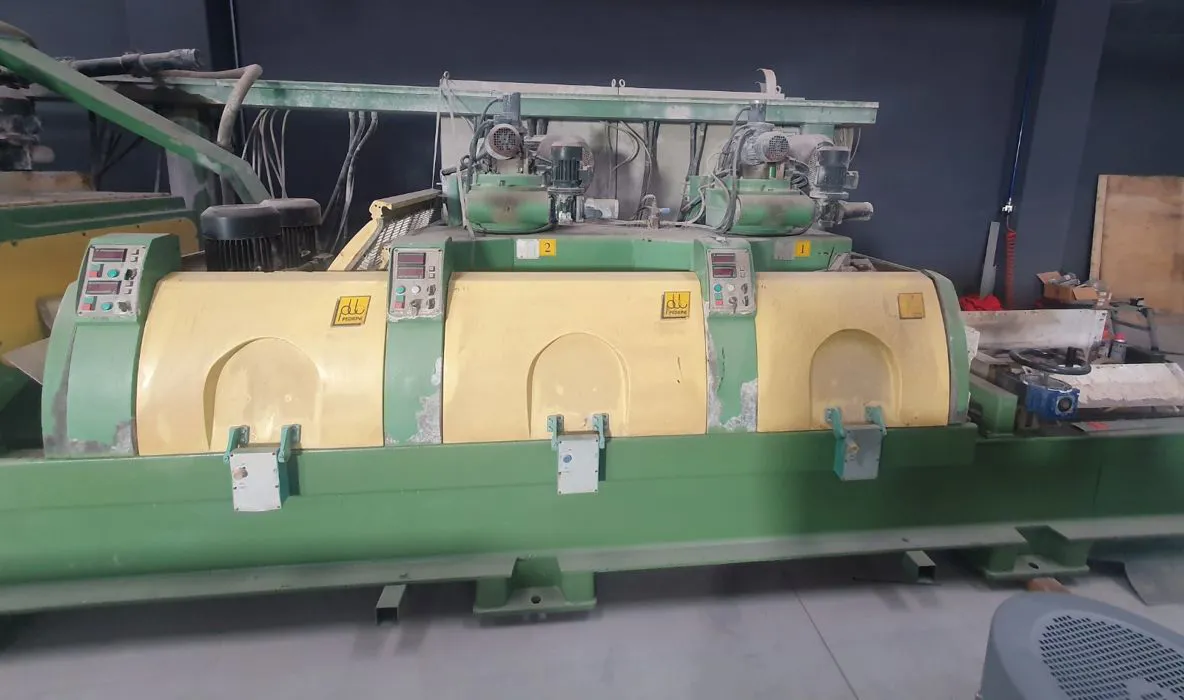 POLISHING AND CALIBRATING MACHINE FOR MARBLE TILE