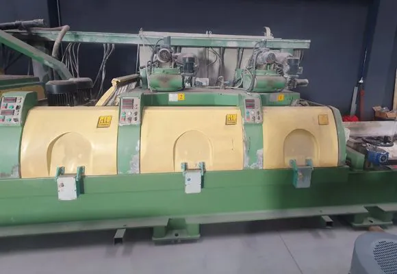POLISHING AND CALIBRATING MACHINE FOR MARBLE TILE